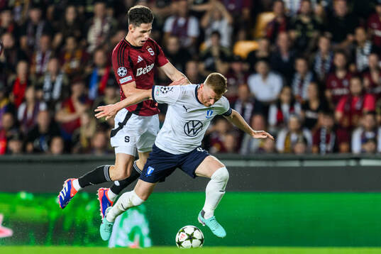 Martin Vitik of Sparta Prag and Anders Christiansen of