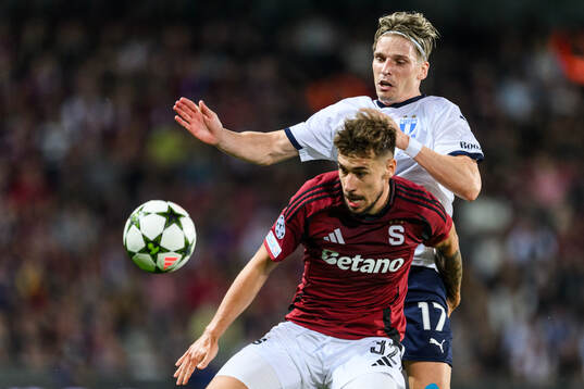 Matej Rynes of Sparta Prague and Jens Stryger Larsen of