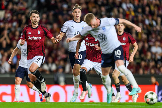 Kaan Kairinen of Sparta Prague and Erik Botheim of Malmö FF