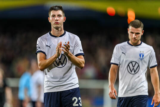 Lasse Berg Johnsen of Malmö FF looks dejected