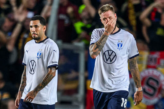Sergio Pena and Pontus Jansson of Malmö FF looks dejected