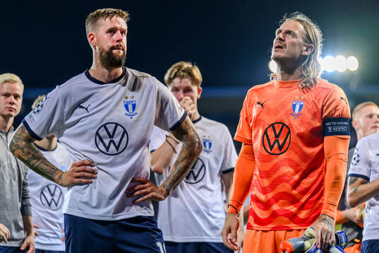 Pontus Jansson and goalkeeper Johan Dahlin of Malmö FF
