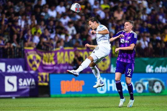 Daniel Stensson of Djurgården and Josip Ilicic of Maribor
