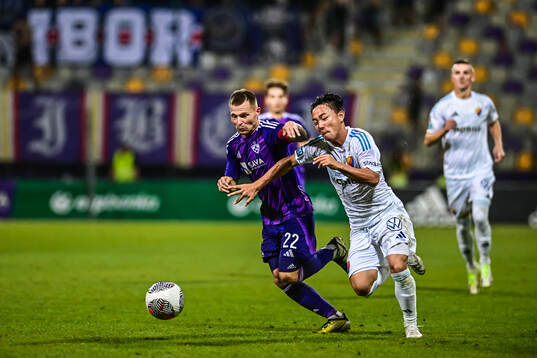 Martin Milec of Maribor and Keita Kosugi of Djurgården