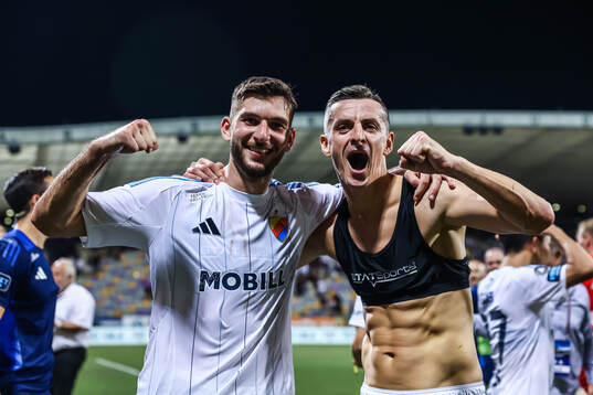 Besard Sabovic and Haris Radetinac of Djurgården celebrate