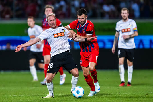 Mikkel Rygaard Jensen of Häcken and Denis Thomalia of