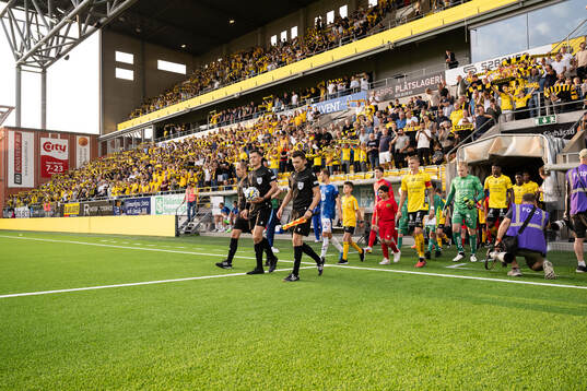 The teams enters the arena