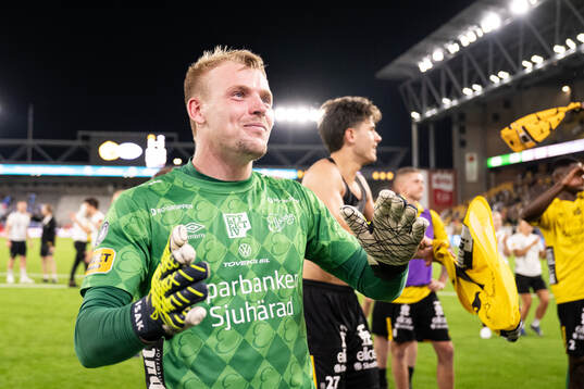 Goalkeeper Isak Pettersson of Elfsborg celebrates