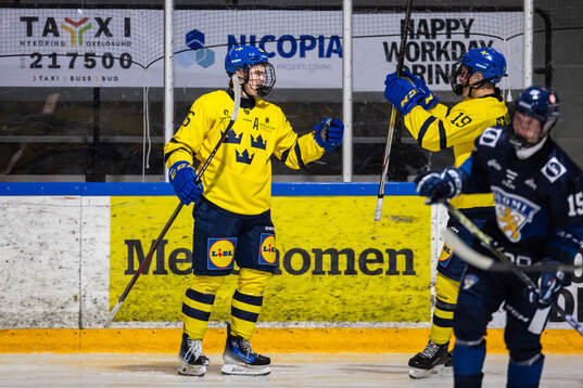Vilgot Lidén of Sweden and Pax Kleffner celebrate the 2-0