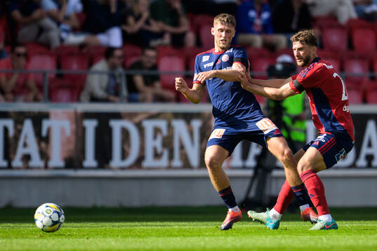 Sandvikens IFs Emil Engqvist och Östers Alibek Aliev