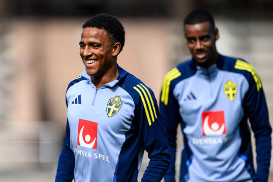 Niclas Eliasson and Alexander Isak of the Swedish men's