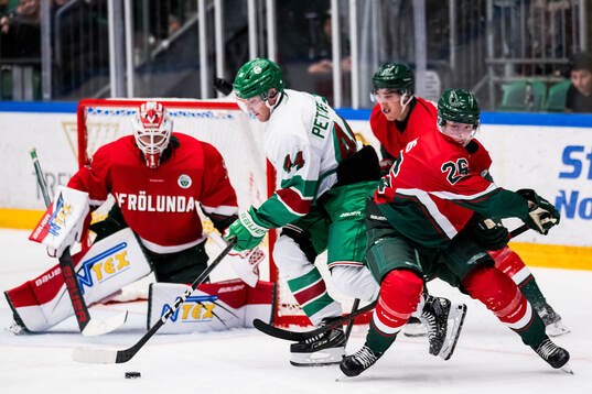 Rögles Jacob Peterson och Frölundas Isac Heens