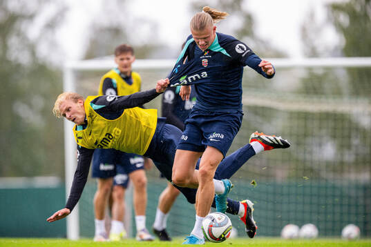 Morten Thorsby and Erling Braut Haaland of the Norwegian