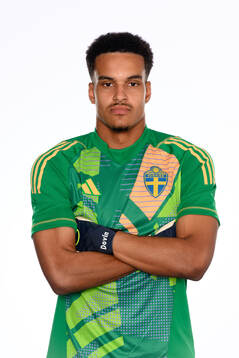 Goalkeeper Oliver Dovin poses for at portrait