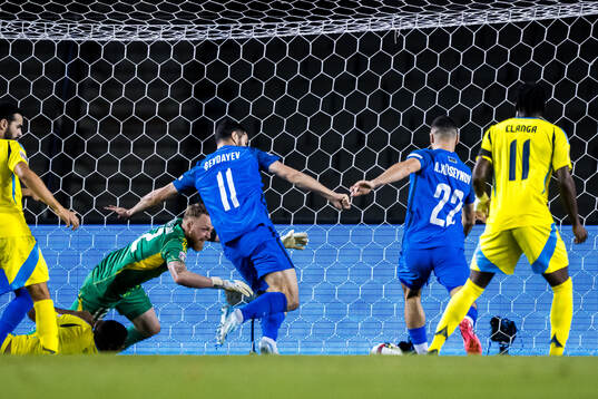Goalkeeper Viktor Johansson of Sweden and Emin Makhmudov of