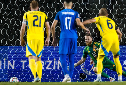 Goalkeeper Viktor Johansson of Sweden saves a penalty shot