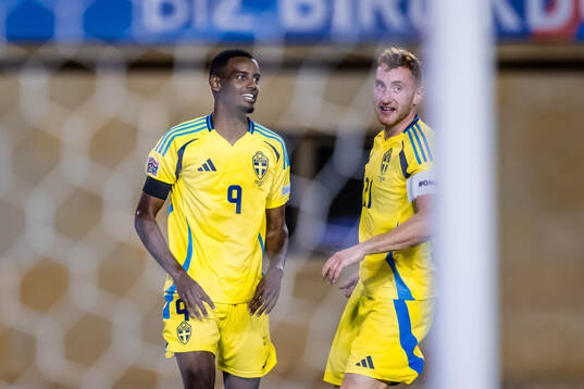 Alexander Isak and Dejan Kulusevski of Sweden celebrate the