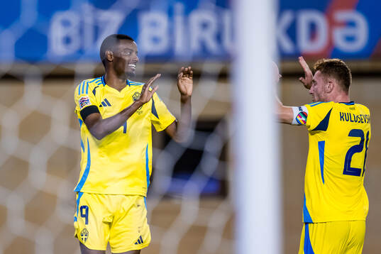 Alexander Isak and Dejan Kulusevski of Sweden celebrate the