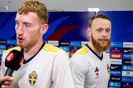 Dejan Kulusevski and goalkeeper Viktor Johansson of Sweden