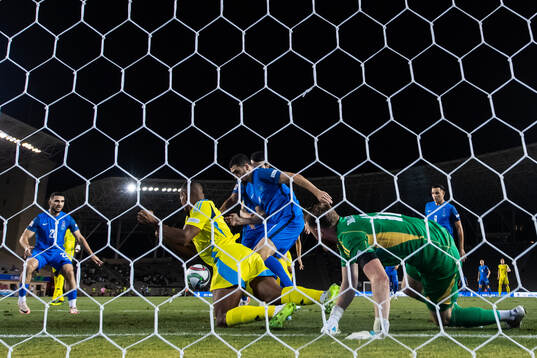 Isak Hien and goalkeeper Viktor Johansson of Sweden against