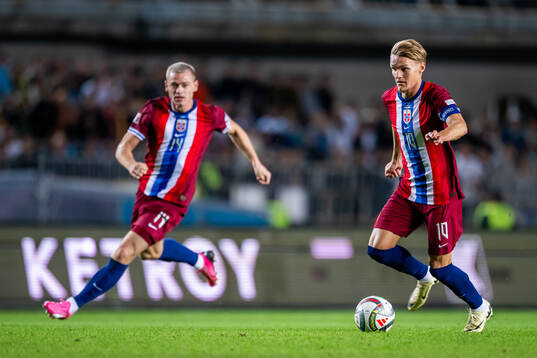Julian Ryerson and Martin Ødegaard of Norway