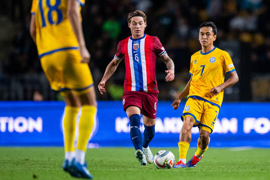 Patrick Berg of Norway and Ramazan Orazov of Kazakhstan
