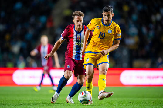 Felix Horn Myhre of Norway and Baktiyor Zainutdinov of