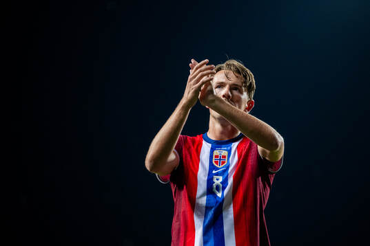 Sander Berge of Norway looks dejected