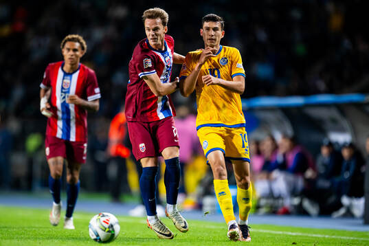 Felix Horn Myhre of Norway and Baktiyor Zainutdinov of