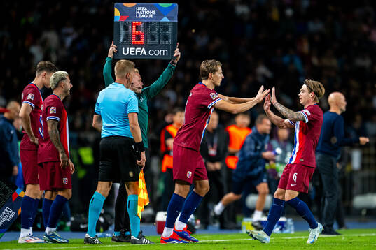 Sander Berge of Norway is substituted with teammate Patrick