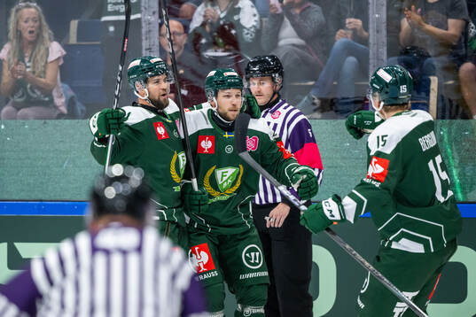 Henrik Björklund and Emil Alba of Färjestad celebrate