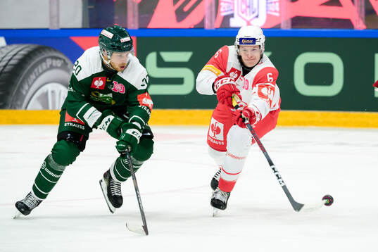 Marcus Westfält of Färjestad and Tobias Sablattnig of