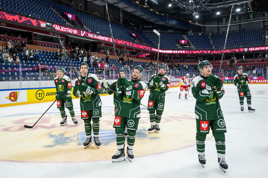 Players of Färjestad celebrate