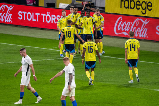 Viktor Gyökeres of Sweden celebrates with team mates