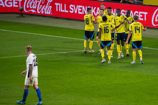 Viktor Gyökeres of Sweden celebrates with team mates