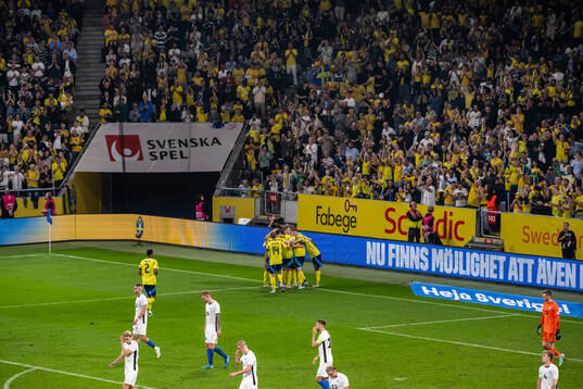 Alexander Isak of Sweden celebrates with team mates