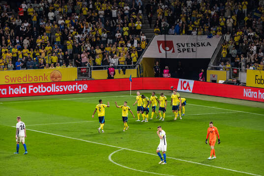 Viktor Gyökeres of Sweden celebrates with team mates