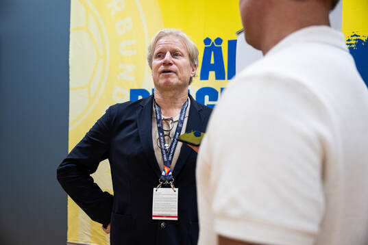 Team manager Stefan Pettersson of Sweden is interviewed