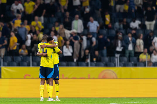 Isak Hien and Alex Douglas of Sweden celebrate