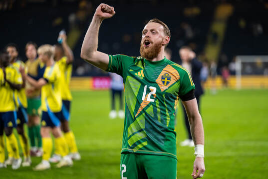 Goalkeeper Viktor Johansson of Sweden celebrates