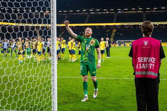 Goalkeeper Viktor Johansson of Sweden celebrates