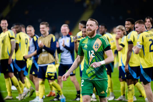Goalkeeper Viktor Johansson of Sweden celebrates