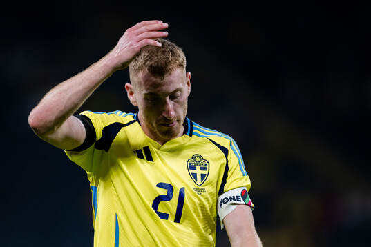 Dejan Kulusevski of Sweden looks dejected