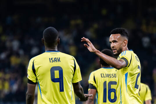 Alexander Isak and Alex Douglas of Sweden celebrate