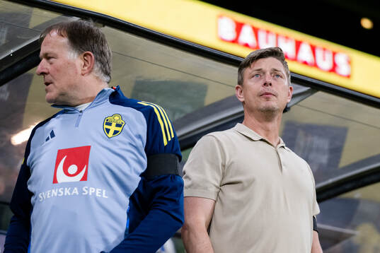 Assistant coach Remy Reijnierse and head coach Jon Dahl