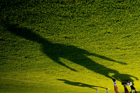 The shadow of a player of the Norwegian national football