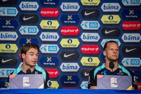 Patrick Berg and goalkeeper Ørjan Håskjold Nyland of the