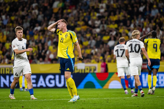 Dejan Kulusevski of Sweden looks dejected