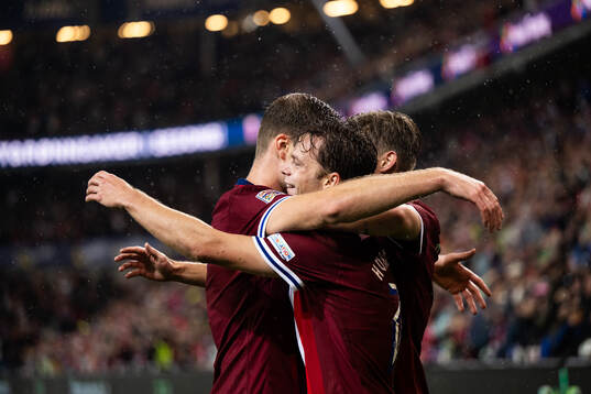 Felix Horn Myhre of Norway celebrates with team mates