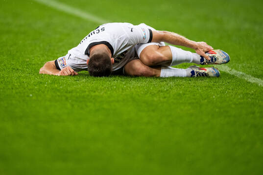 Romano Schmid of Austria in pain